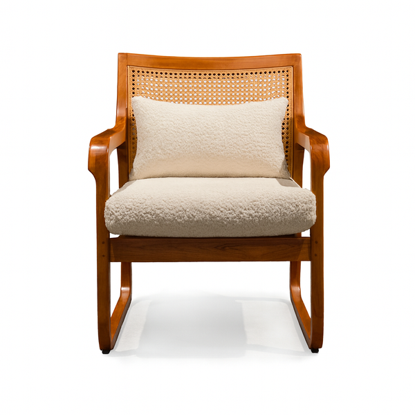 Front view of Dalia Rattan Chair showing rattan cane back and teak wood frame